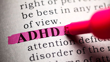 The word ADHD highlighted in pink